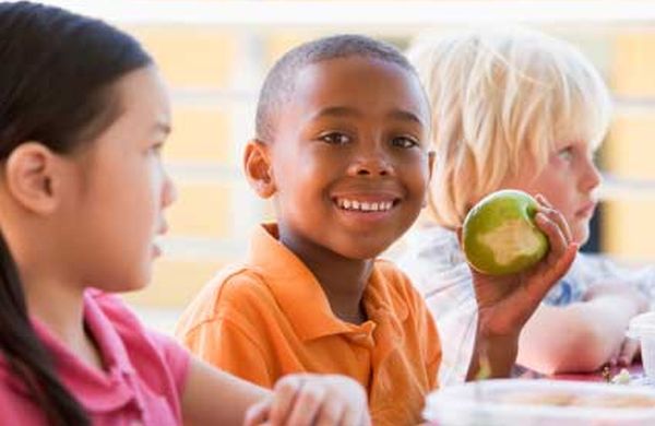 Boy eating apple