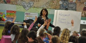 Lisa Richey teaching manners to children